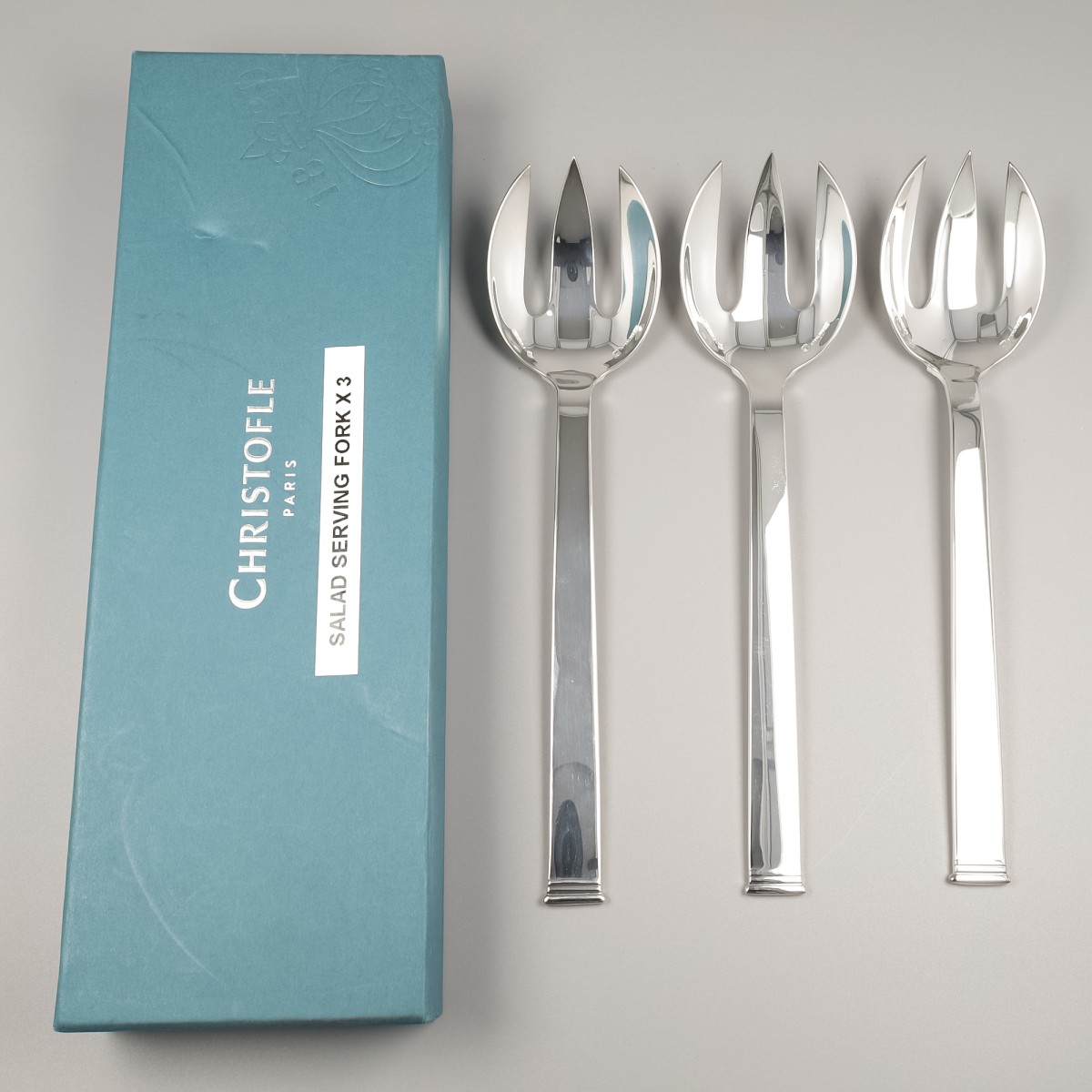 Christofle 3-delig lot salade-serveervorken, model Commodore, Sterling zilver.