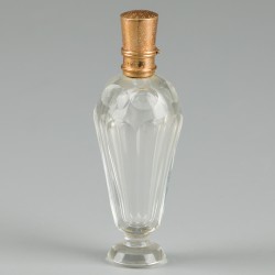 Parfumflacon goud.