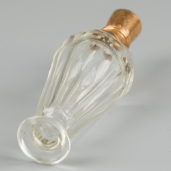 Parfumflacon goud.