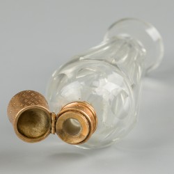 Parfumflacon goud.