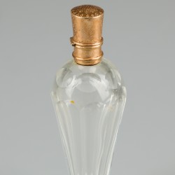Parfumflacon goud.