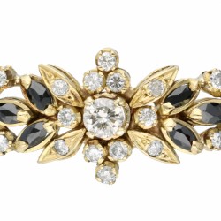 Klassieke geelgouden armband, met ca. 1.34 ct. diamant en granaat - 14 kt.