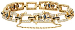 18K Geelgouden vintage schakelarmband bezet met ca. 0.75 ct. diamant en synthetische saffier.
