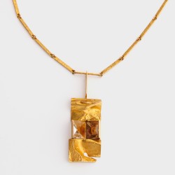  Björn Weckström voor Lapponia 14K geelgouden "Janus" collier en hanger bezet met bergkristal en rookkwarts.