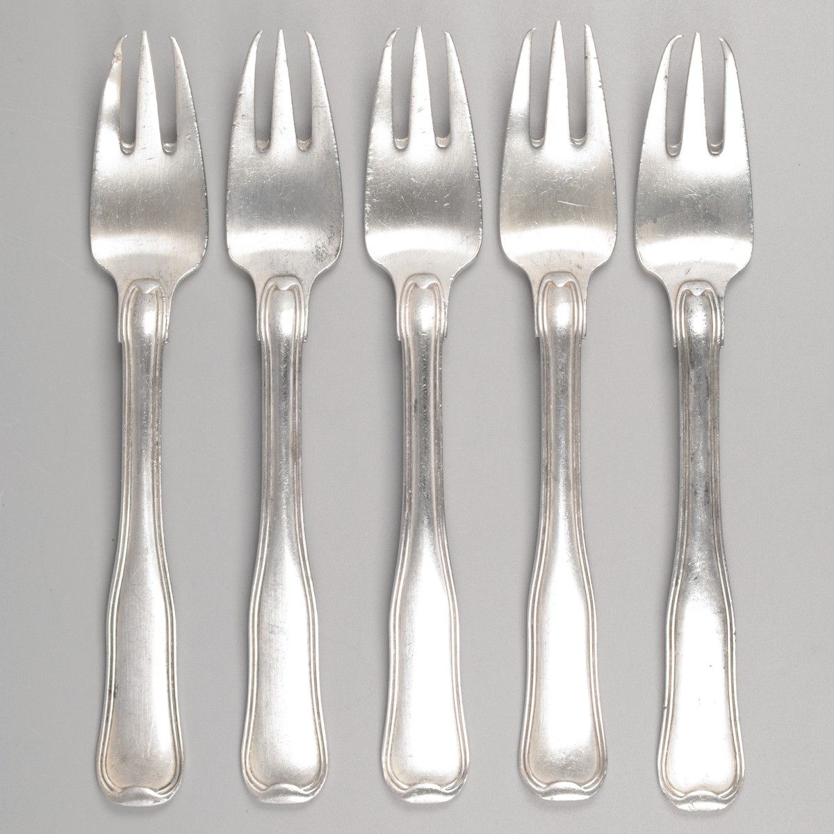 Georg Jensen 5-delige set visvorken, model Old Danish, zilver.