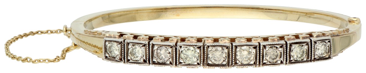14K Geelgouden bangle armband bezet met ca. 1.15 ct. diamant.