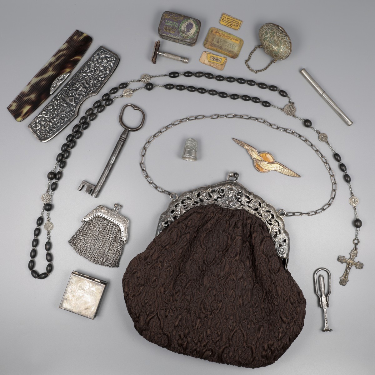 No reserve - Beugeltas zilver (met inhoud)