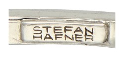 Stefan Hafner 18K witgouden crossover armband bezet met diamant, South Sea en Tahiti parel.