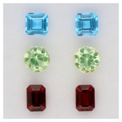 No Reserve - Lot van zes edelstenen bestaande uit sky blue topaas, synthetisch spinel en glasgranaat.