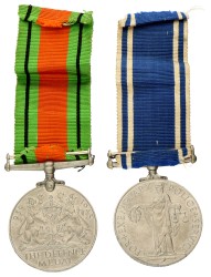 Great Britain. 1936 - 1952. Lot (2) Police medal 'For Exemplary Police Service' & Defence medal 'The Defence medal 1939-1945' - With (loose) Ribbon.