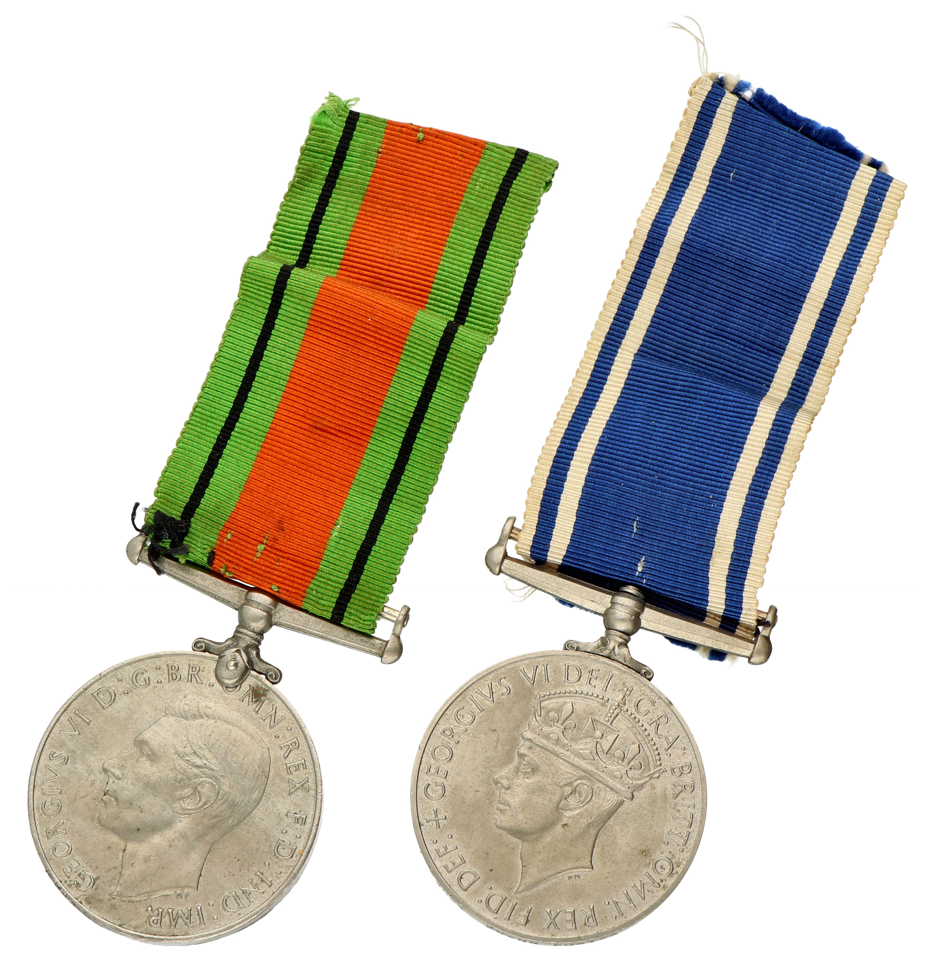 Great Britain. 1936 - 1952. Lot (2) Police medal 'For Exemplary Police Service' & Defence medal 'The Defence medal 1939-1945' - With (loose) Ribbon.