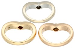 Cartier 18K tricolour gouden 3-stacks ring met princess geslepen diamant.