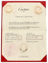 Cartier 18K tricolour gouden 3-stacks ring met princess geslepen diamant.