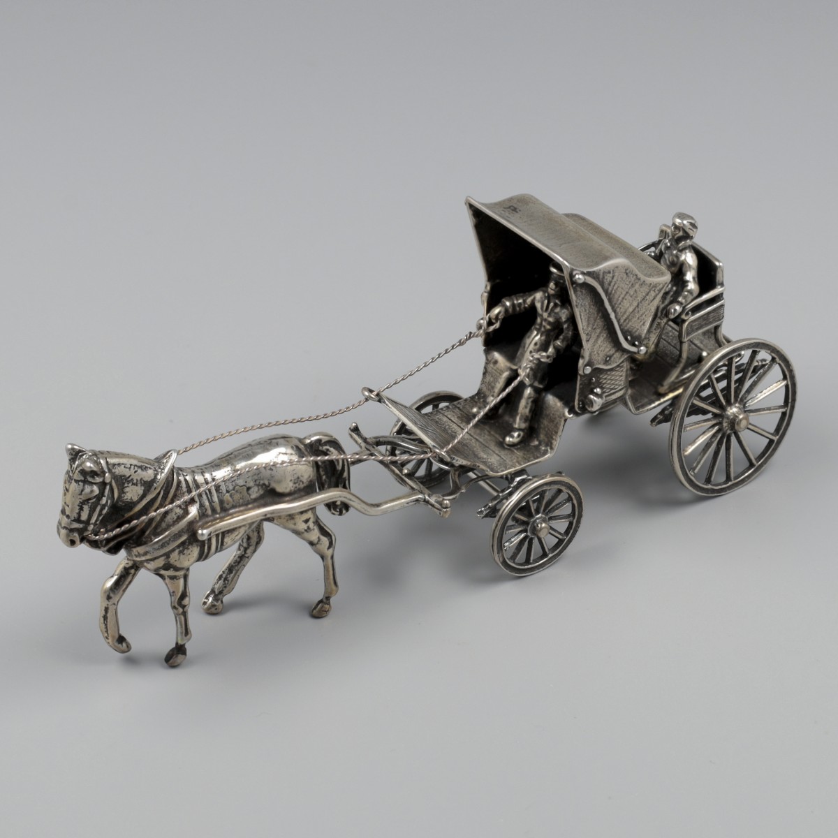 Miniatuur paard-en-wagen zilver.