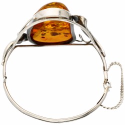 Sterling zilveren bangle armband bezet met barnsteen.
