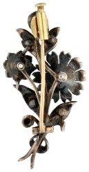 Antieke gouden/zilveren bouquet broche met roos diamant.