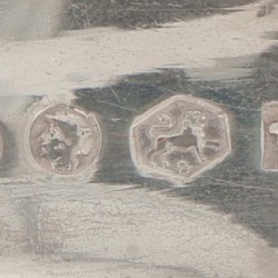 (2) delige set scheplepels zilver.
