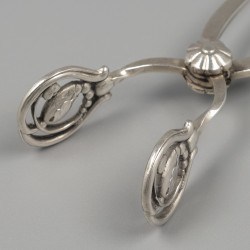 Georg Jensen suikertang, model Blossom, zilver. Ontworpen door Georg Jensen in 1919.