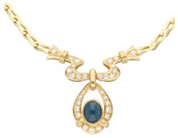 18K Geelgouden collier bezet saffier en diamant.