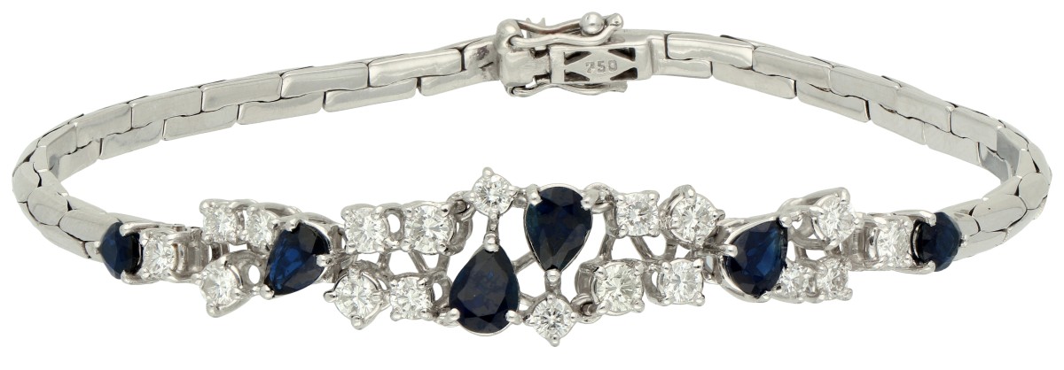 18K Witgouden armband bezet met saffier en diamant.