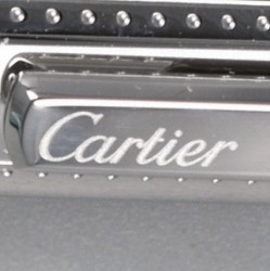 Santos-Dumont de Cartier balpen metaal met palladium, cabochon van blauwe hars.