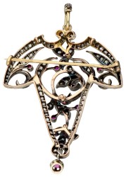 Zilver en gouden multifunctionele hanger/broche met diamant en robijn