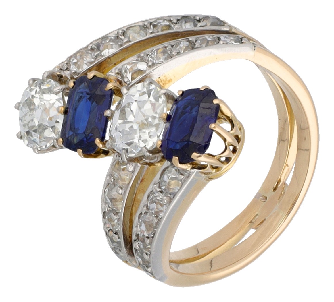 18K geelgouden ring bezet met ca. 1.40 ct. diamant en synthetisch saffier
