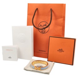 Hermès 'Clic H' vergulde bangle met licht blauw emaille