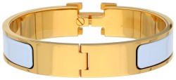 Hermès 'Clic H' vergulde bangle met licht blauw emaille