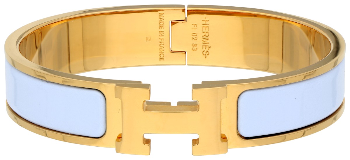 Hermès 'Clic H' vergulde bangle met licht blauw emaille
