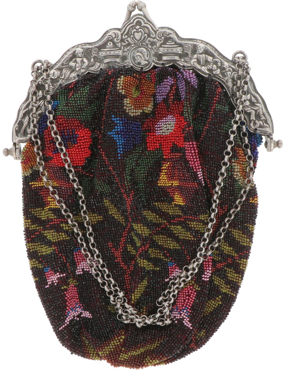 Beugeltasje zilver.