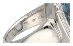 18K Witgouden ring met synthetische aquamarijn en diamant
