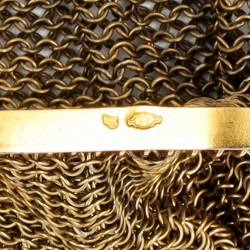 Beugelbeurs goud met diamant, saffier en robijn
