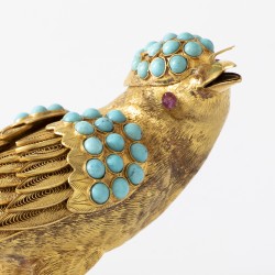 Miniatuur vogel goud met turkoois en robijn