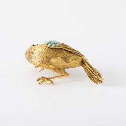 Miniatuur vogel goud met turkoois en robijn