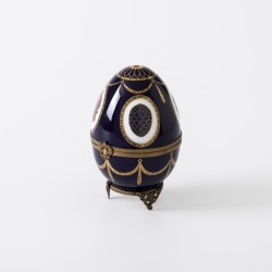 Fabergé "Musical swan Imperial Egg" muziekdoos, Limoges porselein / brons / zilver