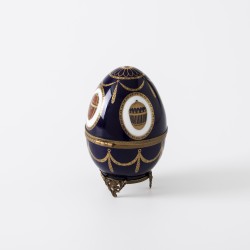 Fabergé "Musical swan Imperial Egg" muziekdoos, Limoges porselein / brons / zilver