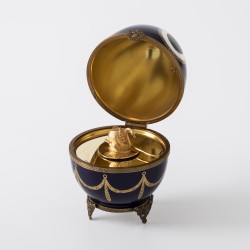 Fabergé "Musical swan Imperial Egg" muziekdoos, Limoges porselein / brons / zilver