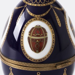 Fabergé "Musical swan Imperial Egg" muziekdoos, Limoges porselein / brons / zilver