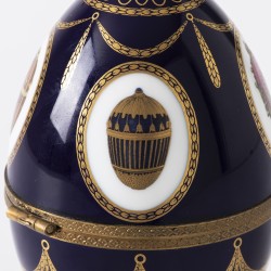 Fabergé "Musical swan Imperial Egg" muziekdoos, Limoges porselein / brons / zilver