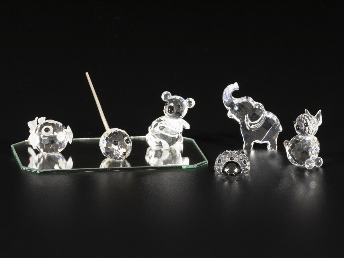 (7) Delig lot Swarovski miniaturen.