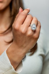 Crivelli 18K white gold certified halo ring set with approx. 3.12 ct. pear cut diamond and approx. 2.45 ct. surrounding diamonds.
