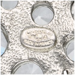 Chanel CC Star zilverkleurige broche bezet met helder witte strass-stenen.