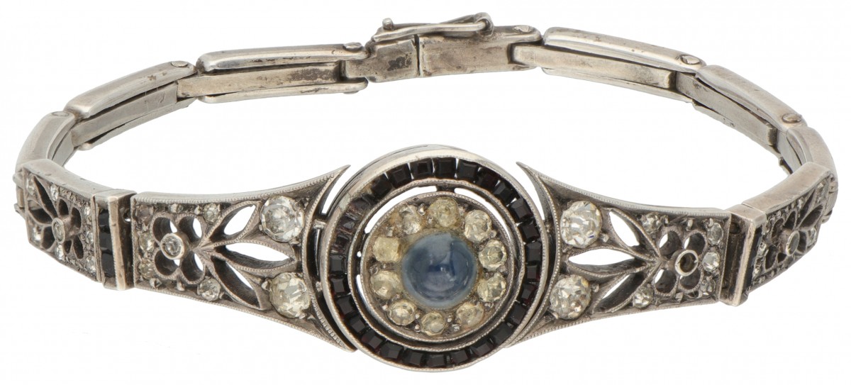 Zilveren opengewerkte armband bezet met natuurlijke saffier en zirkonia - 835/1000.
