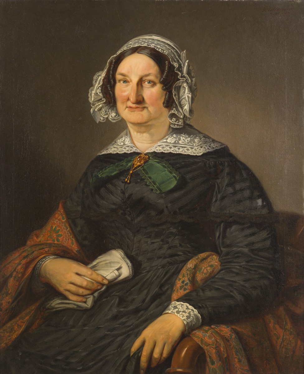 P.A. Haaxman (Delft 1814 - 1887), Portret van een dame met gouden broche.