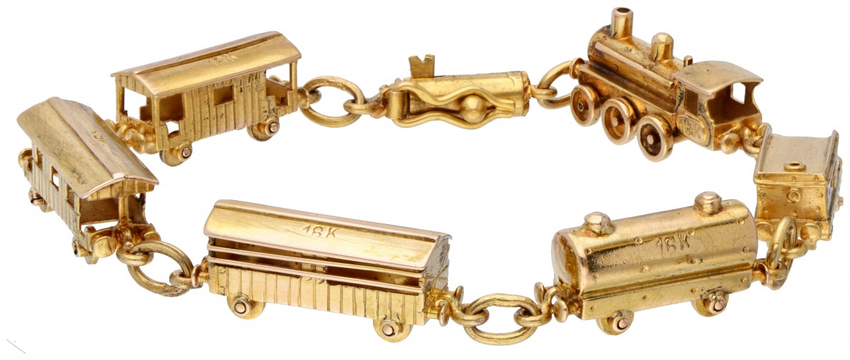 18 kt. Geelgouden armband met locomotief en 5 wagons.