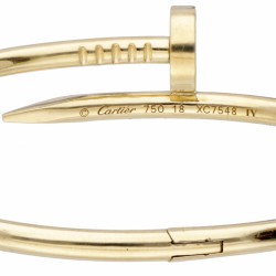 18 kt. Geelgouden klassieke Cartier 'Juste un Clou' bangle armband.