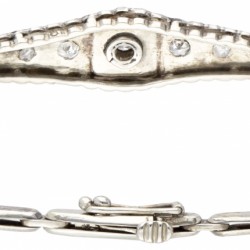 18 kt. Witgouden sierlijke art deco armband bezet met ca. 0.11 ct. diamant en zwarte emaille.