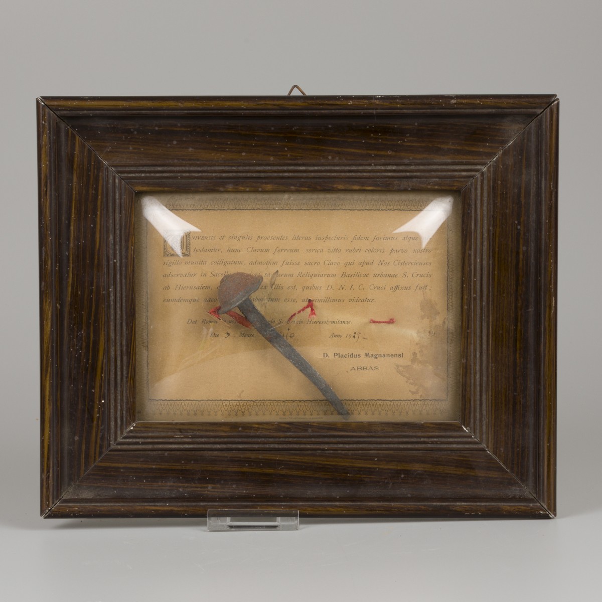 Een relikwie van de kruisiging van Christus (ijzeren nagel), met certificaat (gedateerd 1925).