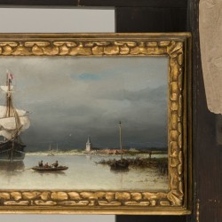 Nicolaas Riegen (Amsterdam 1827 - 1889), Een brik voor anker bij een kustplaats aan de Zuiderzee.